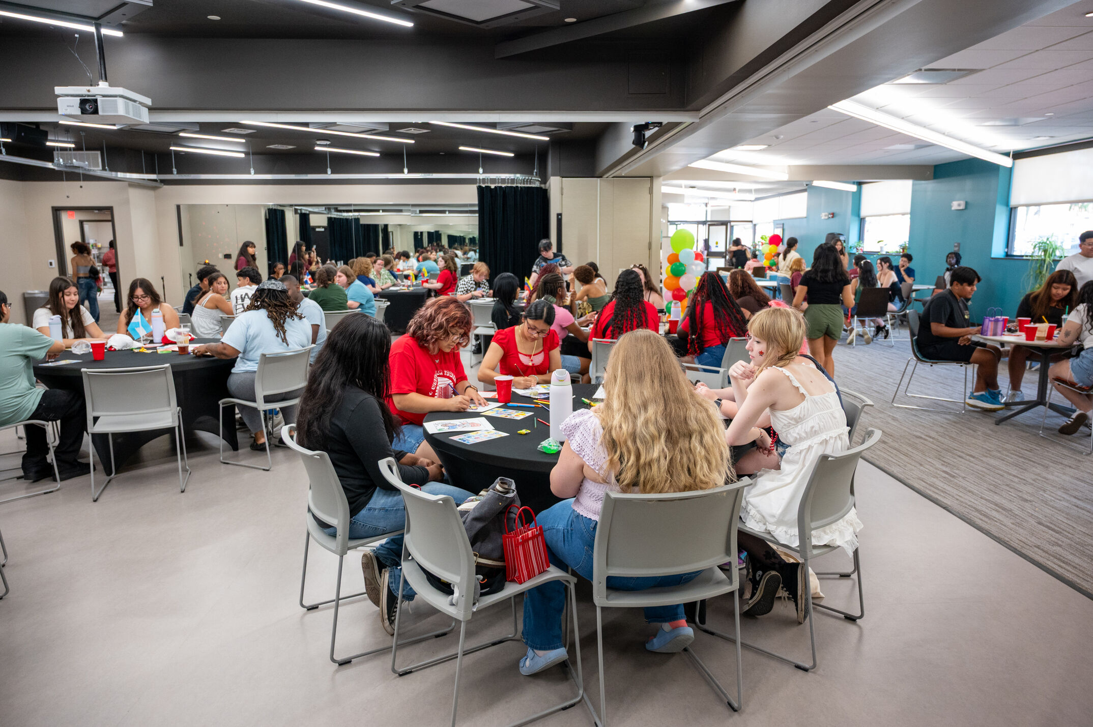 A picture of students at the Multicultural Center's Open House event.